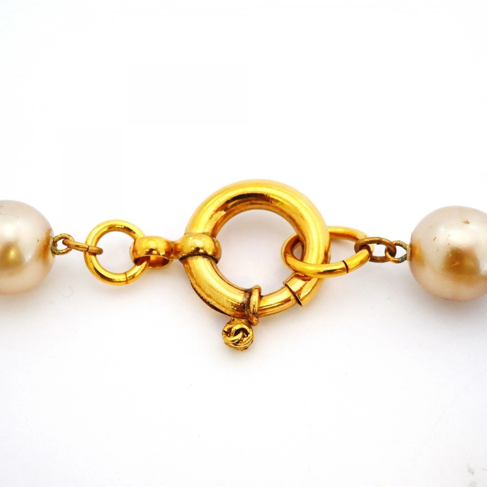 CHANEL Gold Pearl Logo Necklace - Picture 4 of 8